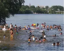  ?? JULIA MALAKIE / LOWELL SUN ?? TAKING A DIP: The Merrimack River is often used for boating and recreation.