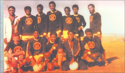  ??  ?? The authentic Dolam Boys... ‘Zorro’ (2nd from left – back row) in the gold and black attire of Pirates FC. Standing from left: Immanuel ‘Chaeros’ /Haoseb (team manager), Eleazer ‘Ou Zoks’ /Haoseb (+d), Moses ‘Moles’ Owoseb, Zebulon ‘Brazello’ Haoseb, Petrus Owoseb, Berries Jagger, Christian Gaseb (+d). Front row from left: Takkie Gaeb, Flicken Garoeb, Wilfred Ochurub, Issascar Gawanab (+d), Kamundu Horaeb (+d).