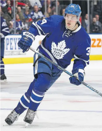  ?? CLAUS ANDERSEN/GETTY IMAGES ?? Toronto Maple Leafs centre Auston Matthews, above, is second out of all NHL rookies in goals and points behind Winnipeg Jets right wing Patrick Laine, left.