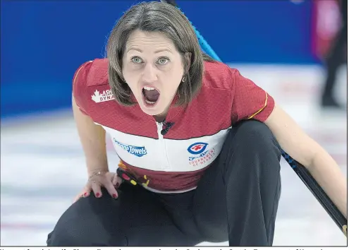  ?? —CP ?? Nunavut fourth Jennifer Blaney directs the sweep as they play Quebec at the Scotties Tournament of Hearts in Sydney, N.S., yesterday. Nunavut won 4-3 and recorded its first victory in the main draw of the event.