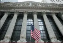  ?? AP PHOTO/MARY ALTAFFER, FILE ?? An American flag flies outside New York Stock Exchange.