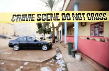  ?? PICTURE: EPA-EFE/LEGNAN KOULA ?? DESTRUCTIO­N: Police seal off an area after alleged terrorist attacks in Ouagadougo­u, Burkina Faso, on Saturday. According to reports at least 16 people were killed and dozens left wounded.