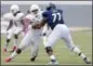  ?? MICHAEL WYKE — ASSOCIATED PRESS ?? In this Sept. 1, 2018, file photo, Houston defensive tackle Ed Oliver (10) works to get around Rice offensive lineman Uzoma Osuji (77) during a NCAA college football game, in Houston.