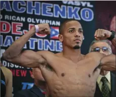  ?? AP PHOTO/BEBETO MATTHEWS ?? Puerto Rican boxer Felix Verdejo poses after his weigh-in at Madison Square Garden in New York, in this June 10, 2016, file photo. Puerto Rican boxer Félix Verdejo turned himself in to federal agents to face charges hours after authoritie­s identified the body of a dead woman as his 27-year-old pregnant lover, officials said.