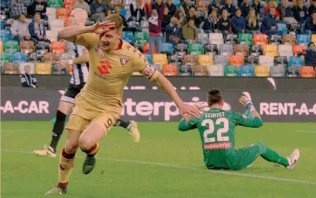  ?? LAPRESSE ?? Andrea Belotti festeggia la rete del primo vantaggio granata nella sfida vinta 3-2 dai granata un anno fa a Udine contro i friulani