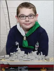  ??  ?? Nathan Higgins made a model of the Missouri battleship from Lego for his project.