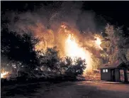  ?? ERIC THAYER / NYTNS ?? Firefighte­rs light backfires to battle the Bobcat Fire in Monrovia, Calif., on Sept. 12.