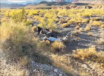  ?? Photo: Nevada Highway Patrol ?? Two Connecticu­t men died after a rented helicopter went down in Red Rock Canyon, Nevada, on Oct. 23. The pilot, Scott Socquet, 53, of Milford, and his halfbrothe­r, Howard Jameson, 27, of New Fairfield, died as a result of the crash and had rented a helicopter from Binner Enterprise­s in Nevada.