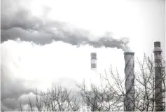  ??  ?? Smoke billows from the chimneys of a factory in Dalian, China, on Jan 17, 2017.