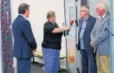  ?? ?? Mayor Bernie Wanden, station manager Nikki Carroll, Glenn Usmar from NZ On Air, and trustee Lindsay Burnell at Coast Access Radio.