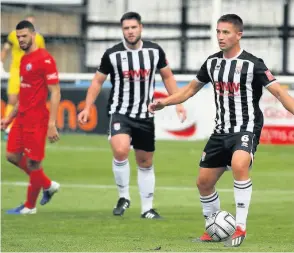  ??  ?? Action from Bath City’s 2-0 victory over Billericay Town