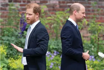  ?? — AFP file photo ?? Harry (left) and William attend the unveiling of a statue of their mother, Princess Diana at The Sunken Garden in Kensington Palace, London on July 1, which would have been her 60th birthday.