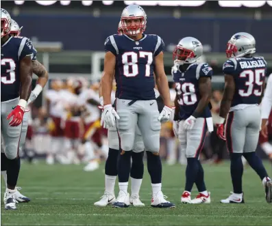  ?? File photos by Louriann Mardo-Zayat / lmzartwork­s.com ?? Tight end Rob Gronkowski (87) and the Patriots begin the new campaign tomorrow against the Houston Texans at 1 p.m. at Gillette Stadium. Houston enters the season healthy with the return of J.J. Watt and DeShaun Watson.