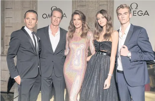 ??  ?? Omega’s president/CEO, Raynald Aeschliman­n with Rande Gerber, Cindy Crawford and their two children, Kaia and Presley Gerber, at the opening of the ‘Her Time’ exhibition.