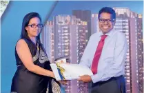  ??  ?? From left: Roshanie Jayasunder­a-moraes, Chief Marketing Officer at John Keells Properties and Dilshan Rodrigo, Chief Operating Officer, Hatton National Bank