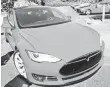  ?? JOHN G. MABANGLO, EPA ?? Tesla says it’s the first death in a crash of a Model S in 130 million miles of self-driving.