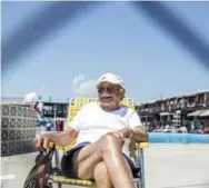 ?? GEORGE ETHEREDGE/THE NEW YORK TIMES ?? Dave Gelfman, 101, relaxes at the Silver Gull Beach Club. He joined a couple of years after it opened in Brooklyn in 1963.