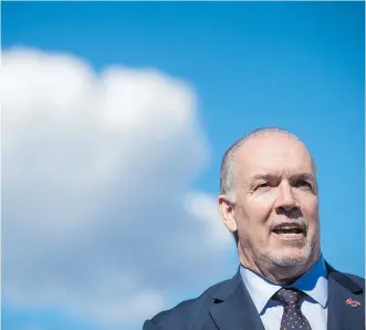  ?? DARRYL DYCK/THE CANADIAN PRESS ?? B.C. Premier John Horgan’s actions opposing the lawfully approved Trans Mountain project have triggered a trade war with Alberta, and exposed his province to potentiall­y hard retributio­n both from Alberta and from the federal government, Claudia...