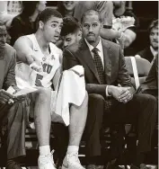  ?? Matthew Visinsky / Getty Images ?? K.T. Turner, right, now Texas’ associate head coach, drew rave reviews from his time at SMU.