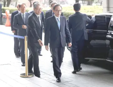  ??  ?? Lee arrives at the prosecutor­s’ office in Seoul, South Korea. — Reuters photo