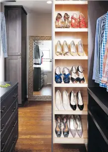  ?? STACY ZARIN GOLDBERG/CASE DESIGN ?? A retractabl­e shoe storage area in this closet keeps shoes organized and easily visible.