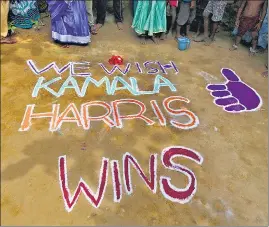  ?? AFP/AP ?? (Left) A "Count Every Vote, Protect Every Person" rally after the US election in Seattle, Washington on Wednesday. (Right) A message wishing Kamala Harris victory at her ancestral village in India.