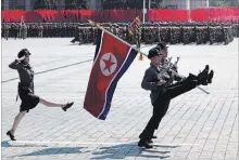  ?? NG HAN GUAN THE ASSOCIATED PRESS ?? Soldiers marched its best-trained goose-stepping units in the parade in Pyongyang, North Korea, Sunday.