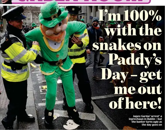  ??  ?? Japes: Gardaí ‘arrest’ a leprechaun in Dublin – but the banter turns ugly as the day goes on