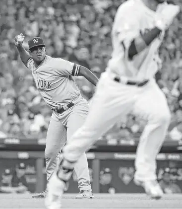  ?? Karen Warren / Houston Chronicle ?? Yankees starting pitcher Luis Severino, left, pitched well in his first start of the ALCS, allowing just two hits over four innings, but he was pulled amid manager Joe Girardi’s concerns over a possible injury.