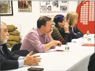  ?? Luther Turmelle / Hearst Connecticu­t Media ?? U.S. Sen. Chris Murphy, D-Conn., center, U.S. Rep. Rose DeLauro, D-Conn., and West Haven Mayor Nancy Rossi listen to veterans’ health care concerns Saturday during a forum at the West Haven Veterans Museum.