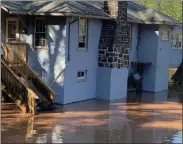  ?? IMAGE FROM SCREENSHOT ?? This home along Perkiomen Creek remained surrounded by water Thursday.