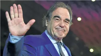  ?? JUNG YEON-JE/GETTY IMAGES ?? Filmmaker Oliver Stone, above, announced he is dropping out of a TV show planned by the Weinstein Company after allegation­s of sexual abuse against Harvey Weinstein.