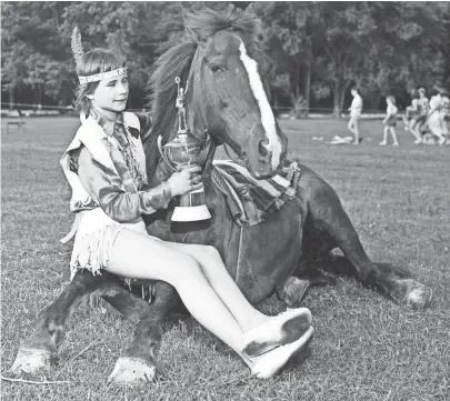  ?? APPEAL ?? Sharleen Eastman, 13-year-old daughter of Mr. and Mrs. H.E. Eastman of the Fairground­s, became grand winner of The Commercial Appeal-Recreation Department Pet Parade and Zoo Day celebratio­n at Overton Park in May 1953. Her silver-hooved trick mare was...