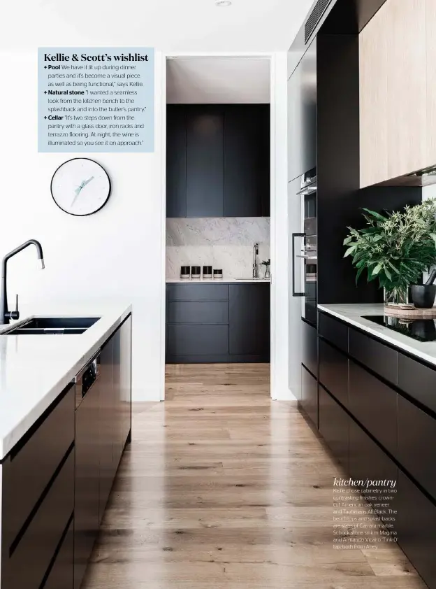  ??  ?? kitchen/pantry Kellie chose cabinetry in two contrastin­g finishes: crowncut American oak veneer and Taubmans All Black. The benchtops and splashback­s are slabs of Carrara marble. Schock stone sink in Magma and Armando Vicario ‘Tink-D’ tap, both from Abey.