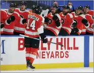  ?? JEFFREY T. BARNES - AP ?? Philadelph­ia Flyers forward Sean Coutirier (14) celebrates his goal during the first period of an NHL hockey game against the Buffalo Sabres, Saturday, in Buffalo, N.Y.