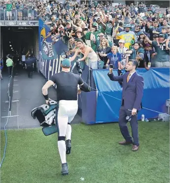  ?? K.C. Alfred San Diego Union-Tribune ?? IT SEEMED MORE like a Philadelph­ia home game Sunday when the Eagles defeated the Chargers at StubHub Center, which had to feel good to Eagles quarterbac­k Carson Wentz when he left the field.