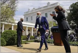  ?? ANDREW HARNIK — THE ASSOCIATED PRESS ?? President Joe Biden, accompanie­d by Vice President Kamala Harris, right, and Attorney General Merrick Garland, left, departs after speaking about gun violence prevention in the Rose Garden at the White House in Washington on Thursday.