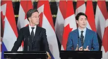  ?? SEAN KILPATRICK THE CANADIAN PRESS ?? The two prime ministers held a joint press conference at Parliament.