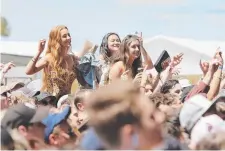  ?? Picture: MATHEW FARRELL ?? Fans enjoy a performanc­e by Australian singer-songwriter Alex Lahey at the Falls Festival.