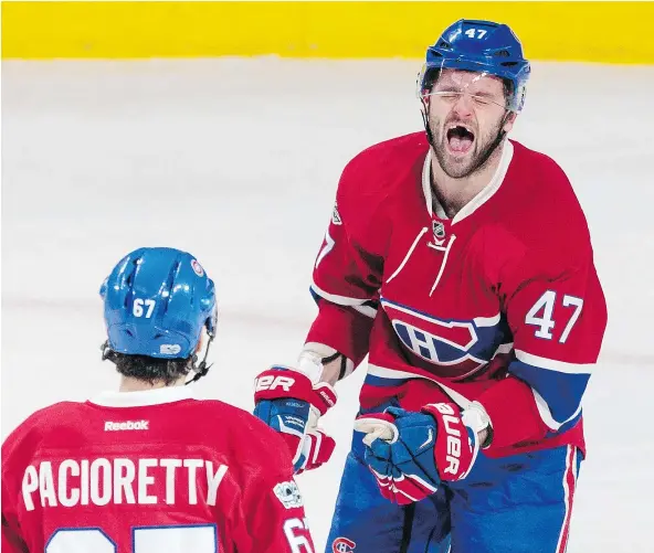  ?? — POSTMEDIA NEWS FILES ?? Montreal Canadiens winger Alexander Radulov, right, celebrates a goal by teammate Max Pacioretty against the Buffalo Sabres in Montreal on Tuesday. Pacioretty is impressed with Radulov’s play, but not by the Russian’s new post-goal ritual.