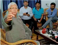  ?? PTI ?? Lalu addresses media after CBI conducted raids at his residence in connection with fresh case of alleged irregulari­ties, in Ranchi. —