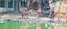  ?? ANIL K MAURYA/HT ?? Children amid the squalor of Pura Padain dalit slum in Allahabad.