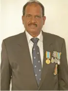  ??  ?? Retired Police Superinten­dent, Deo Narayan with his 50th Anniversar­y Independen­ce Commemorat­ive Medal on November 25, 2020