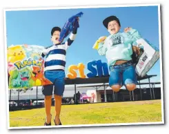  ??  ?? Cody-Jett Farag, 6, and Levi MacDonald, 8, enjoy their showbags.