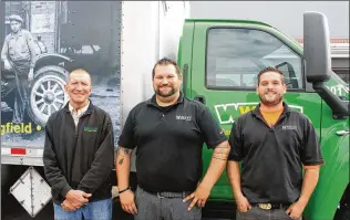  ?? KAITLIN SCHROEDER PHOTOS / STAFF ?? Jeff Ungerecht (from left), Michael Butler and Aaron King help Weiler Welding’s specialty beverage gas division produce the specific gas blends your favorite drinks require.