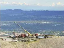  ?? SoCalGas / Associated Press file ?? Utility crews and technical experts, shown working in November, were this week finally able to stop the flow of natural gas at the SoCalGas Aliso Canyon facility near Los Angeles.