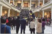  ?? TY TAGAMI/ AJC 2024 ?? Students visit the state Capitol on Feb. 22. They were there to meet lawmakers and promote school choice. This week, the state considers whether to close two charter schools in Cherokee and Fulton counties.