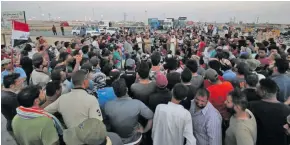  ?? Photo: Reuters ?? Protesters block the road to Iraq’s Umm Qasr port, south of Basra, Iraq July 13, 2018.