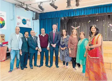  ?? ?? Cllr Andrew Johnson, leader of the Royal Borough, with Hindu Society of Maidenhead members.