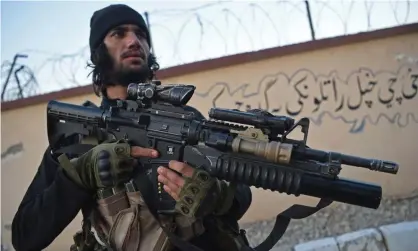  ?? ?? A Taliban fighter in Jalalabad, the capital of Nangarhar province, Afghanista­n. Photograph: Wakil Kohsar/AFP/Getty Images